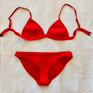 Red with stitched designs Triangl bikini.